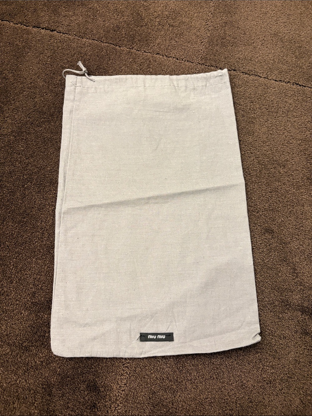 Miu Miu grey dust bag